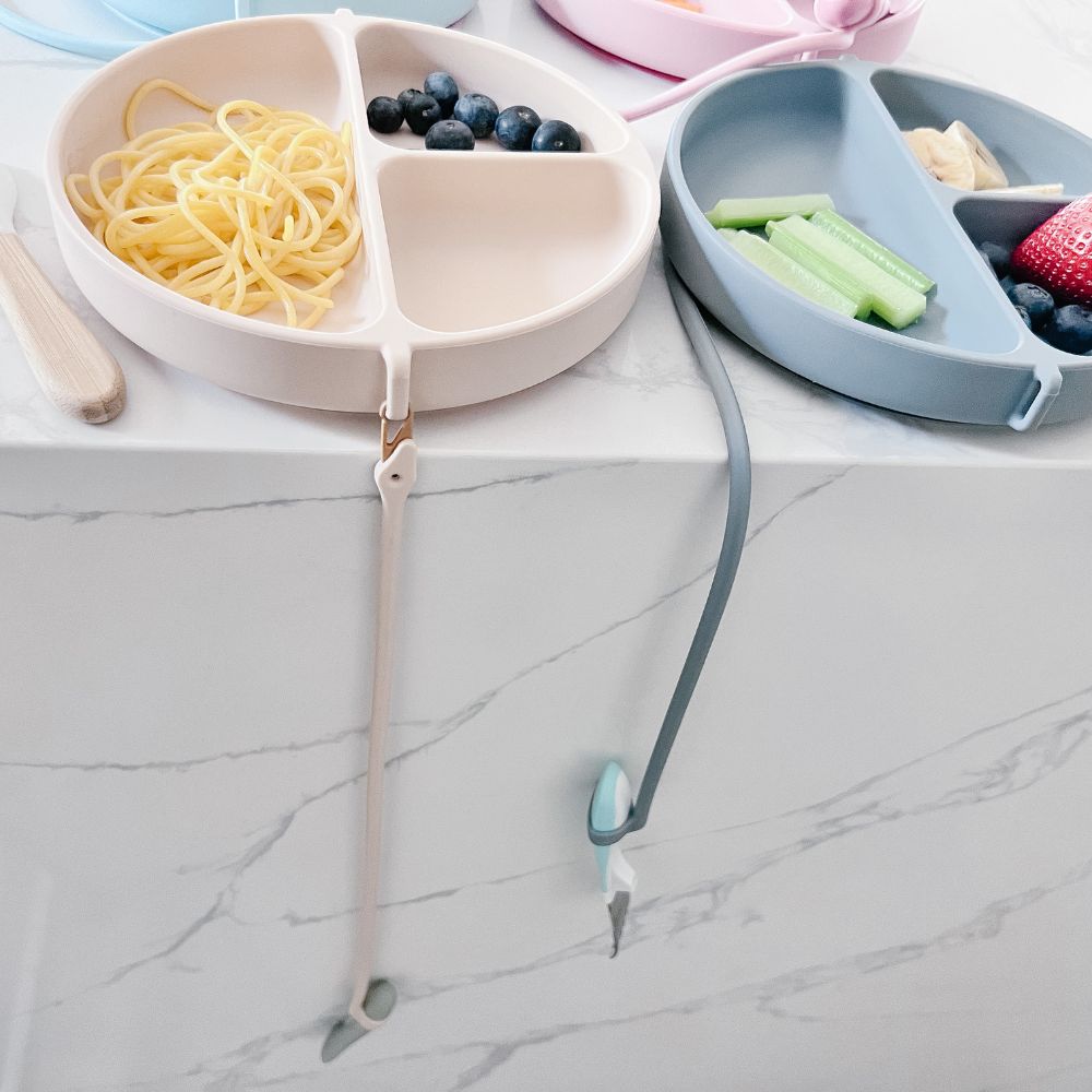 dropless utensil attachment fork spoon on kitchen quartz counter top