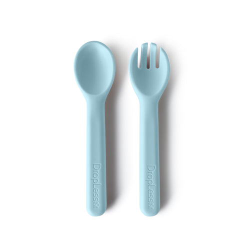 Light blue spoon and fork set on a white background