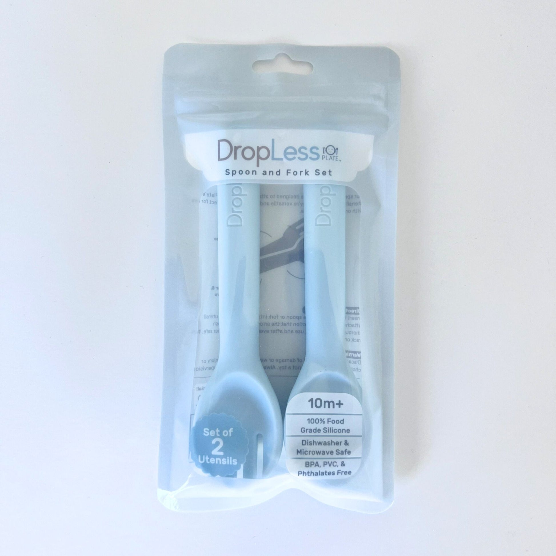 Packaged set of 'DropLess' spoon and fork on a white background